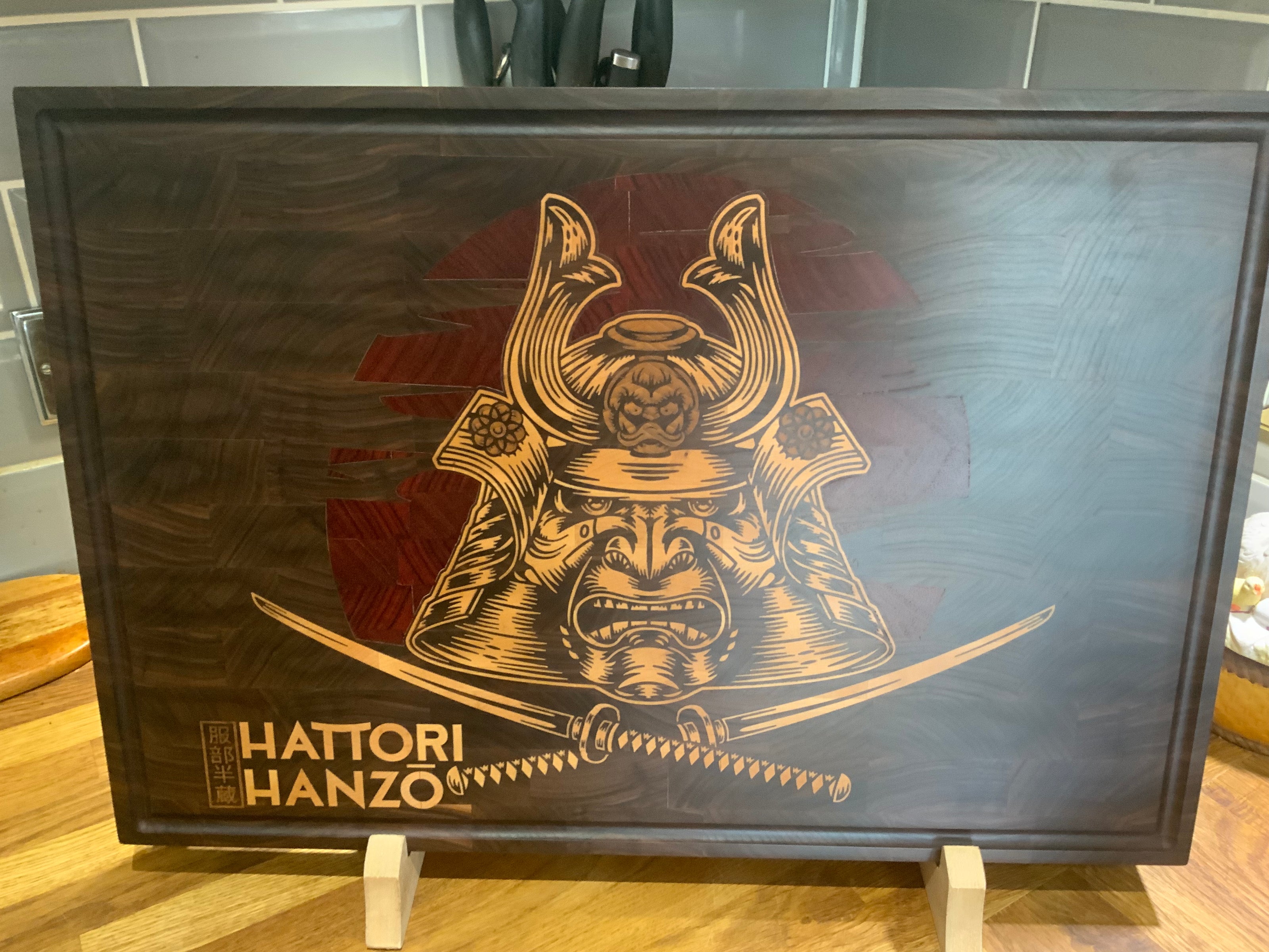 Custom Hattori Hanzo inlay on Walnut cutting board